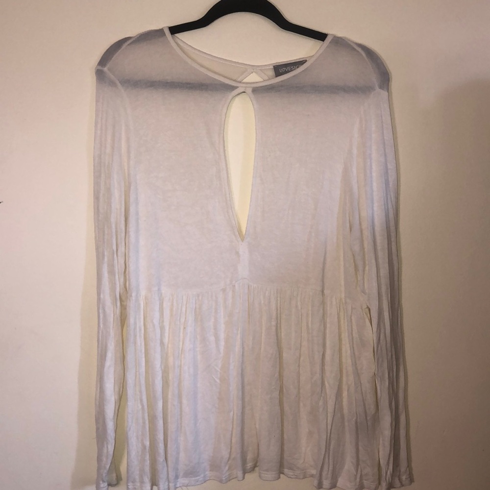 Peep hole flowy blouse